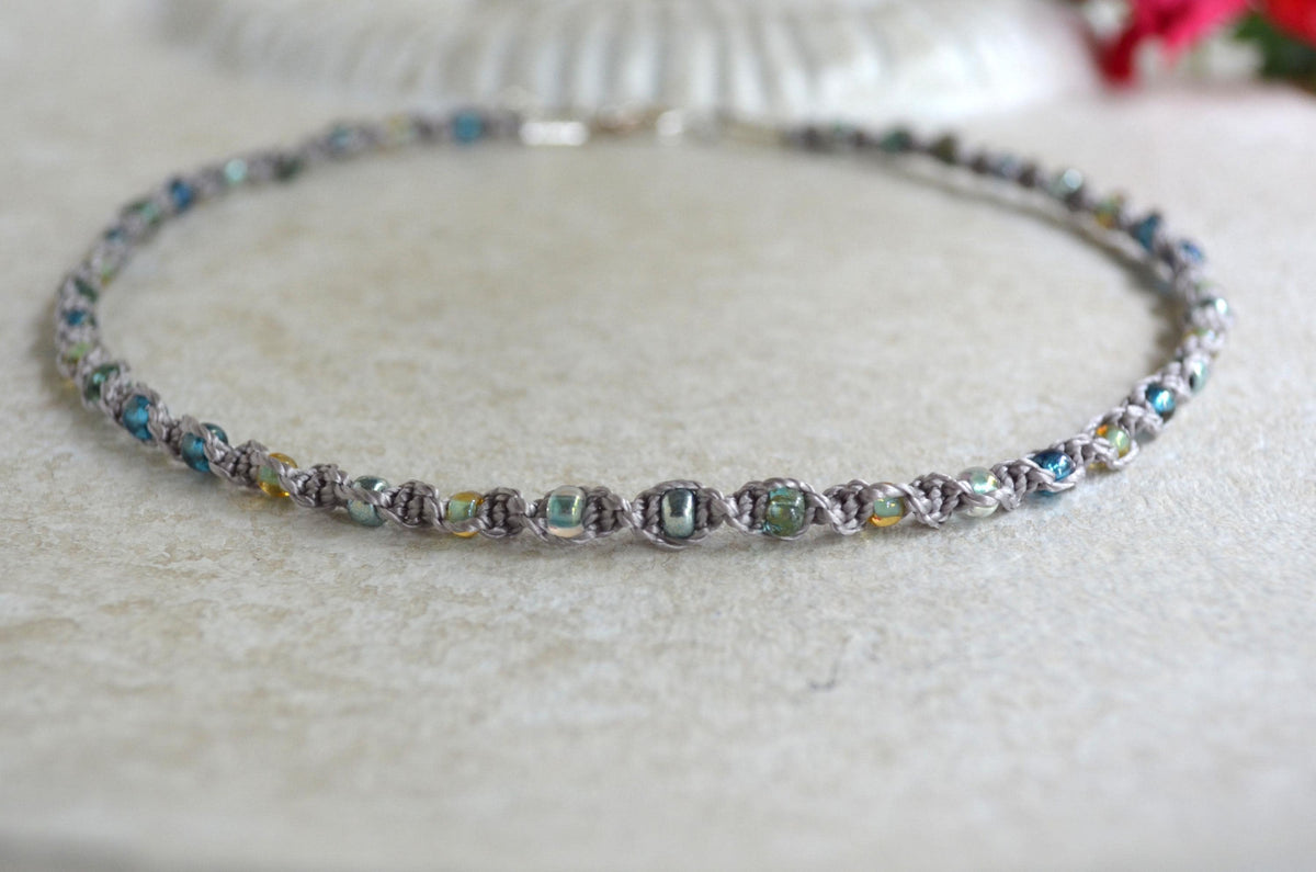 Beaded necklace on a light background