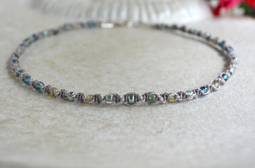 Beaded necklace on a light background