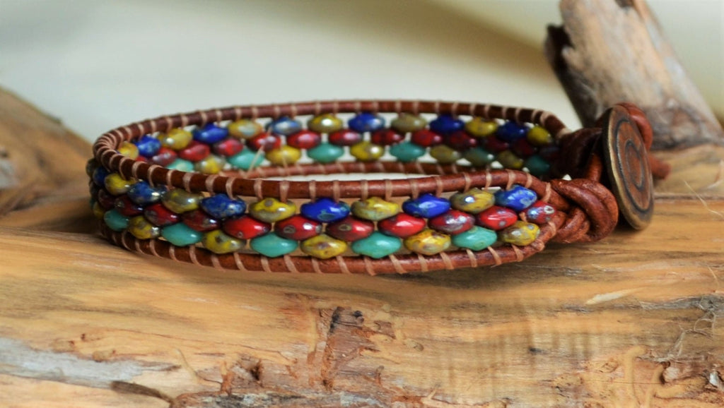 Multicolored beaded bracelet on a wooden surface