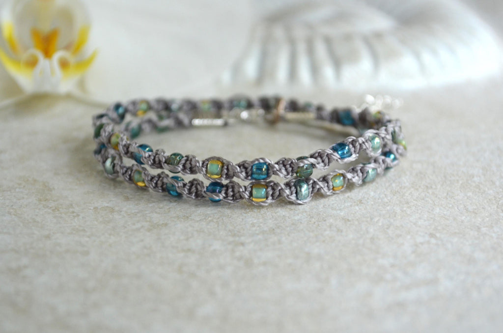Multicolored beaded necklace on a light background