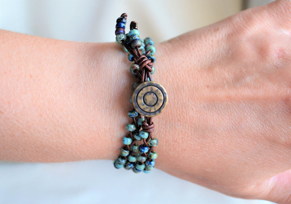 Beaded bracelet on a wrist with a blurred background