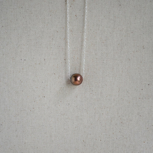 Chocolate Edison pearl floating necklace close-up, warm bronze luster, sterling silver chain