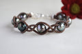 Tahitian Pearl Bracelet: Seven Dark Pearls on Brown Leather